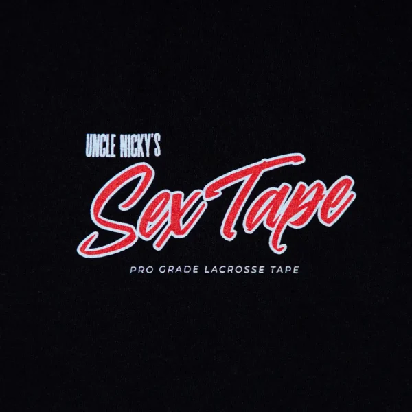 Uncle Nicky’s Sex Tape Logo – Pro Grade Lacrosse Tape Shirt Detail Close-up of Uncle Nicky’s Sex Tape logo in red and white on a black t-shirt, reading “Pro Grade Lacrosse Tape”