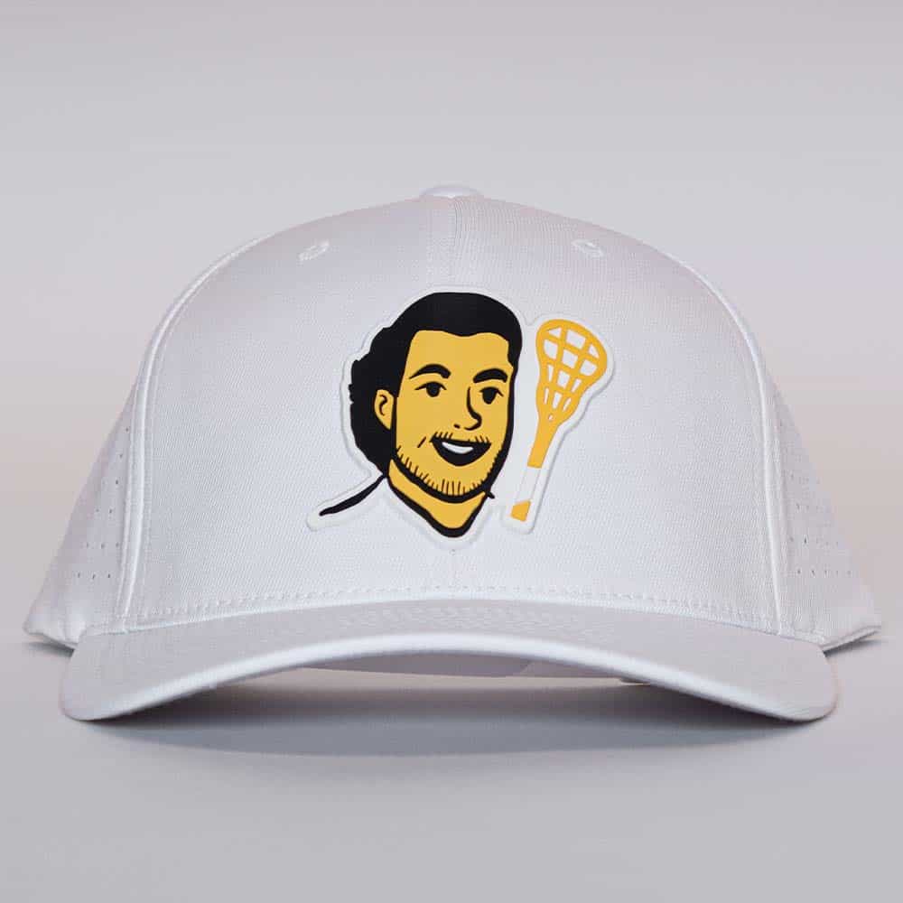 White performance hat with illustrated Uncle Nicky face and lacrosse stick exclamation graphic