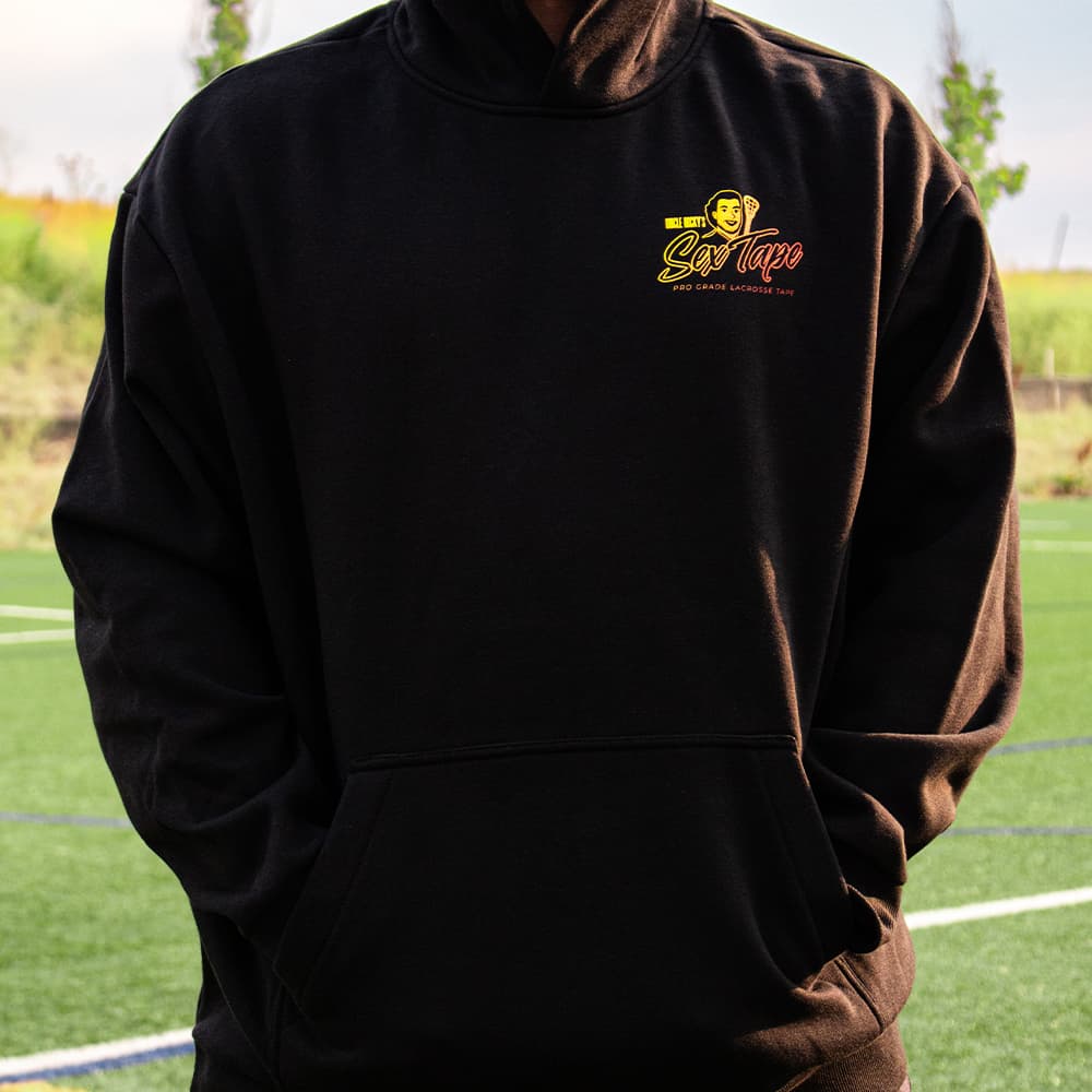 Front of black Uncle Nicky's Sex Tape hoodie with yellow and red sunset chest logo and kangaroo pocket